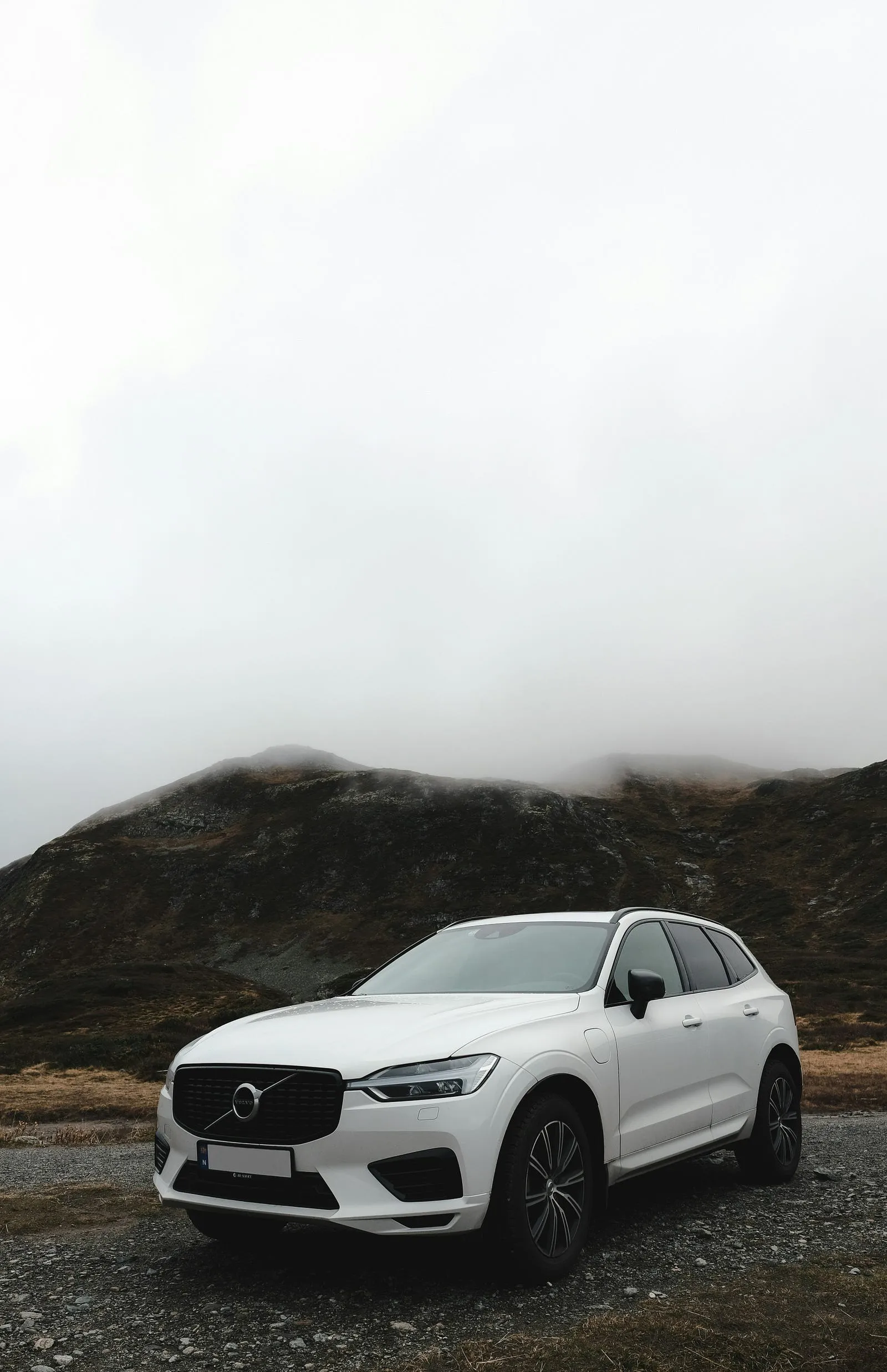 A car driving through a mountain road